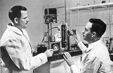 Charles B. Coggin, MD, and Olaf A. Bloomquist, MD, in a corner of their laboratory