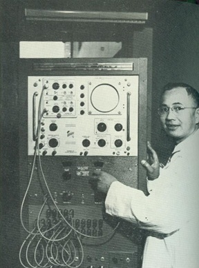 Edward H. G. Hon, MD with the electronic equipment he developed over a period of seven years, with the financial assistance of the National Institutes of Health.