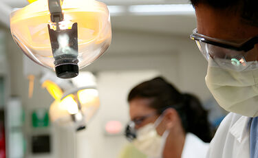 clinicians in lab with face masks
